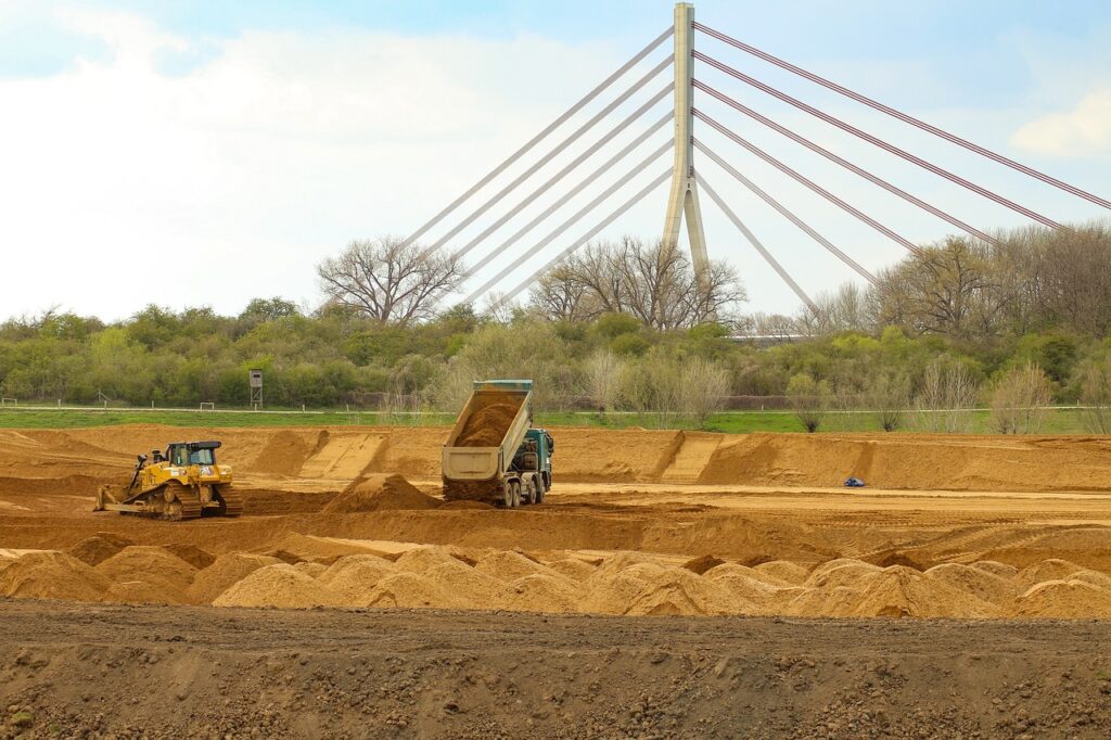 heavy machinery, dam construction, construction site, trunk dam, backfilling, hydraulic engineering, construction machinery, truck, rhine-lip-port, rheinbrücke, deltaport, wesel, earth, floor, ground, bulldozer